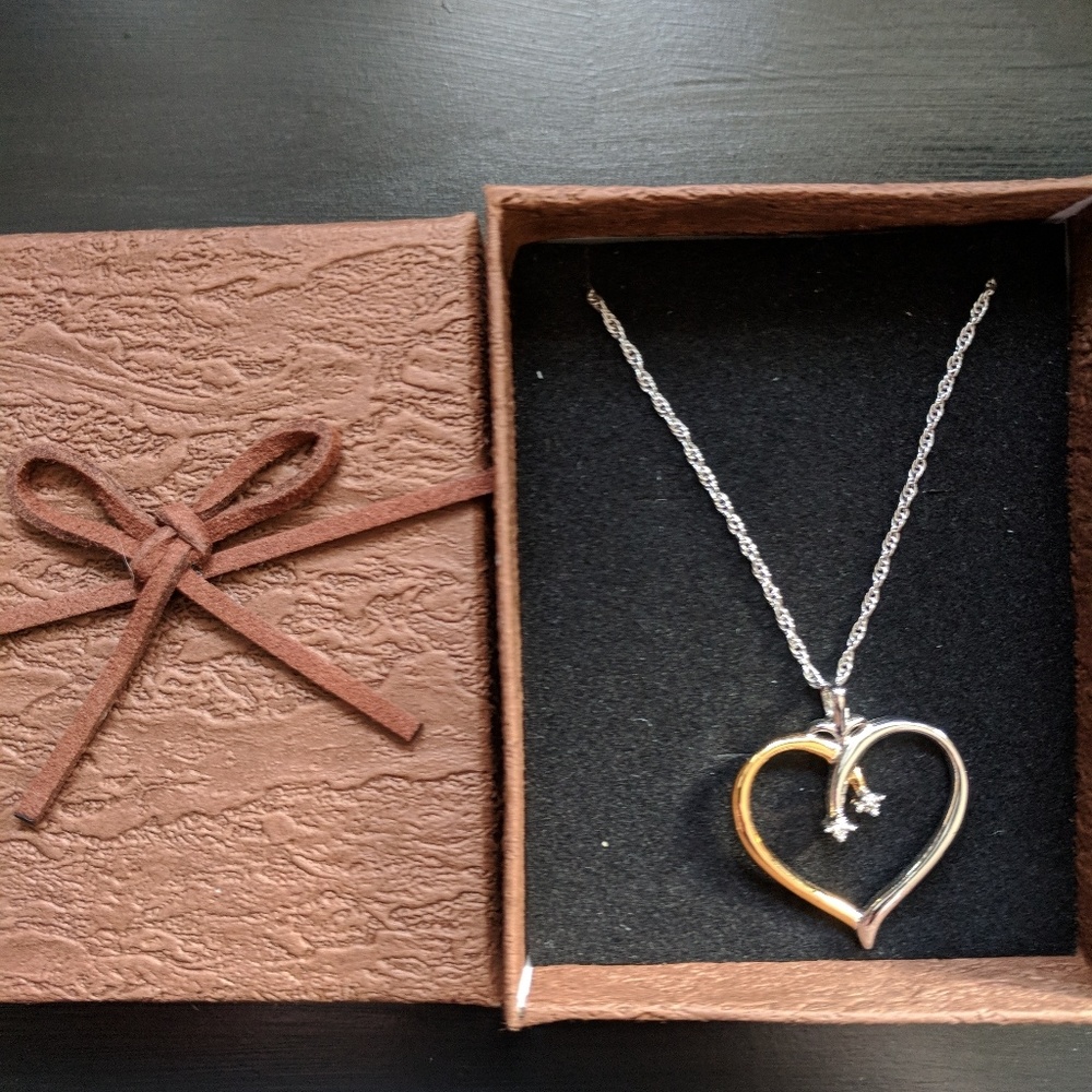 Silver and gold necklace. Two real diamonds